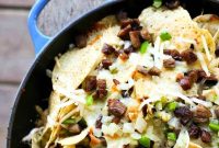 Smoky Brisket Nachos with Melted Cheese and Pico de Gallo