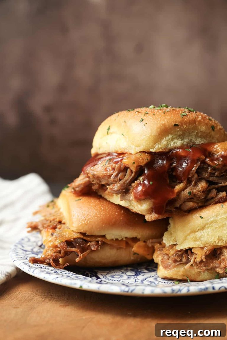 Smoky Pulled Pork Sliders with Tangy BBQ Sauce 12 featured 34532