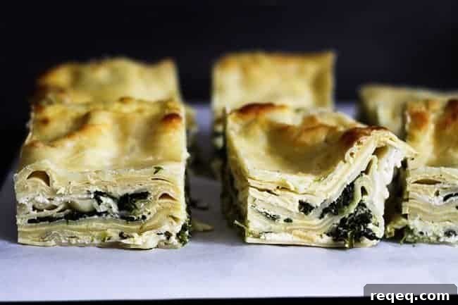 Roasted Garlic Spinach Alfredo Lasagna Recipe — Make-Ahead Meal 4 Roasted Garlic Spinach Alfredo Lasagna cut into servings to be frozen from Foodie with Family