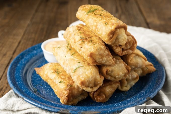 Crispy Corned Beef Egg Rolls with Tangy Dipping Sauce 5 Pan with egg rolls ready to fry