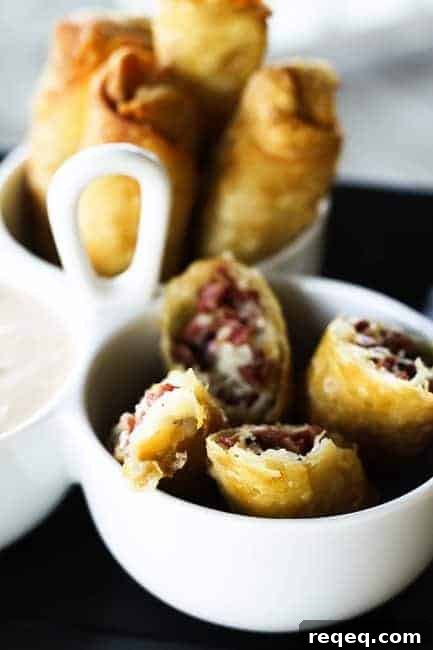 Crispy Corned Beef Egg Rolls with Tangy Dipping Sauce 10 Reuben egg rolls plated