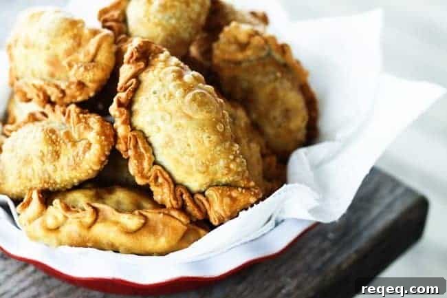 Sweet and Spicy Pulled Pork Empanadas | www.foodiewithfamily.com
