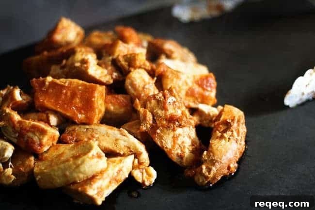 Make-Ahead Honey Sriracha Slow-Cooker BBQ Chicken 3 Gentle sweetness from honey brings out the best of the tasty heat from Sriracha in this great Slow-Cooker Honey Sriracha Barbecue Chicken. Pile the chicken high on sandwiches topped with a cucumber, cilantro salad, and a fried egg ~or~ on a tossed salad, in tacos or on a chicken fajita or barbecue pizza. Leftovers store beautifully in individual portions in the freezer.