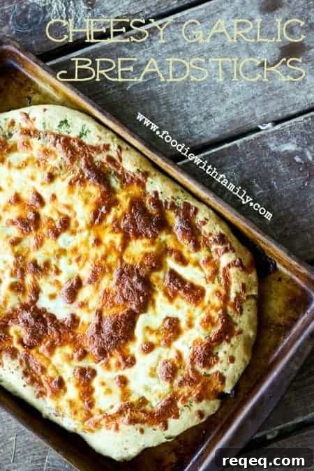 Cheesy Garlic Breadsticks from www.foodiewithfamily.com