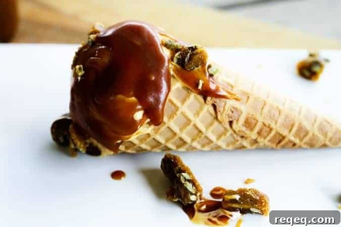 Pumpkin Cheesecake Ice Cream Recipe — No-Churn Mix & Freeze 4 Pumpkin Cheesecake Ice Cream with Salted Caramel and Pepita Brittle | www.foodiewithfamily.com