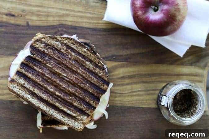 Crispy Ham, Cheddar, Apple & Caramelized Onion Panini Recipe 3 Ham, Cheddar, Apple, and Onions Panini www.foodiewithfamily.com