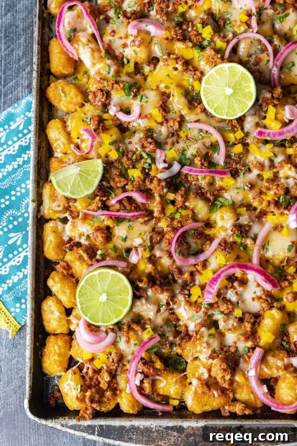 Change up Nacho Night by serving crave-ably good Tater Tot Nachos a.k.a. Totchos. These irresistible crispy baked tots are topped with spicy Chorizo, gooey melted Cheddar, pickled onions, and other nacho goodies!