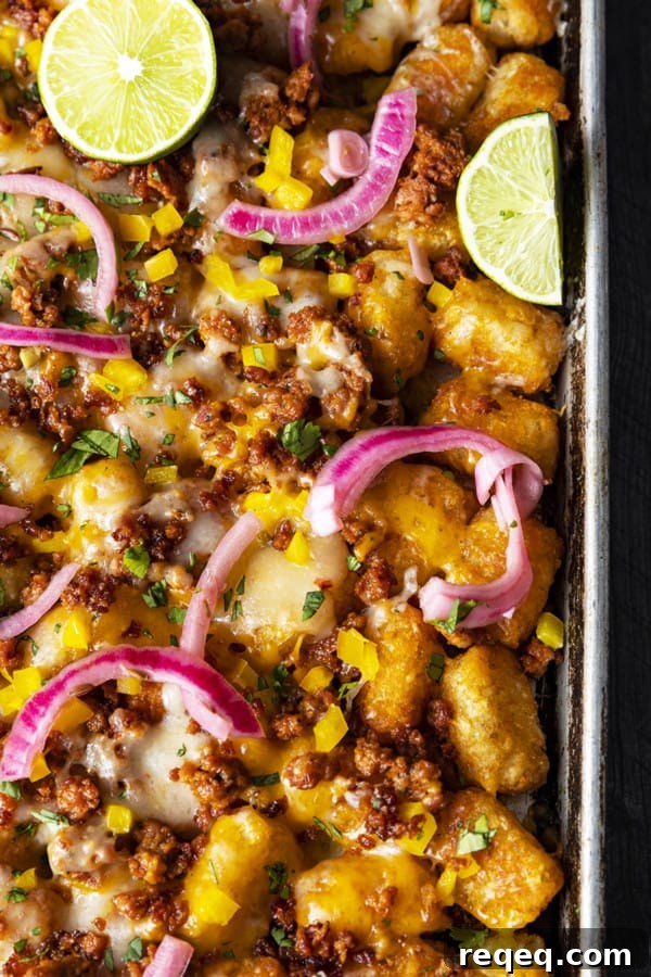 Change up Nacho Night by serving crave-ably good Tater Tot Nachos a.k.a. Totchos. These irresistible crispy baked tots are topped with spicy Chorizo, gooey melted Cheddar, pickled onions, and other nacho goodies!
