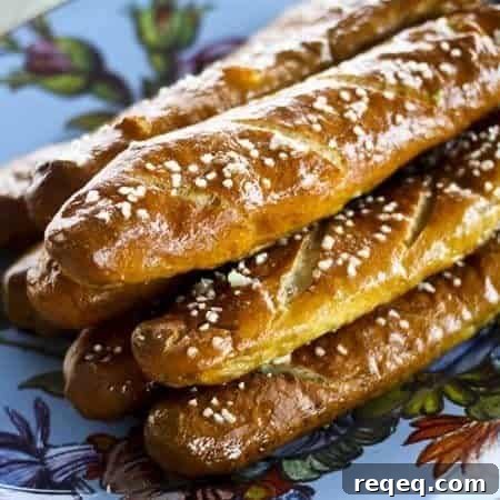 Giant Garlic Butter Pretzel Rod Recipe for Soft, Chewy Bites 3 Giant Garlic Butter Soft Pretzel Rods foodiewithfamily.com