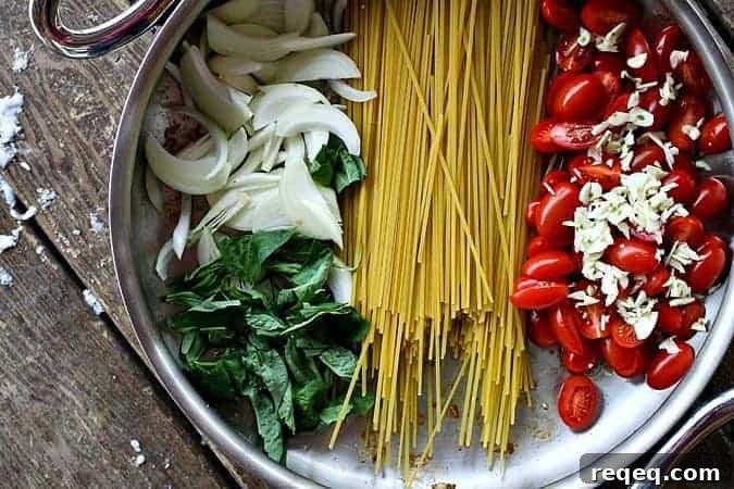 25-Minute One-Pot Chicken Parmesan Pasta Recipe 5 One Pot Lightened Up Chicken Parmesan Pasta #pasta #light foodiewithfamily.com #OnePotMeal