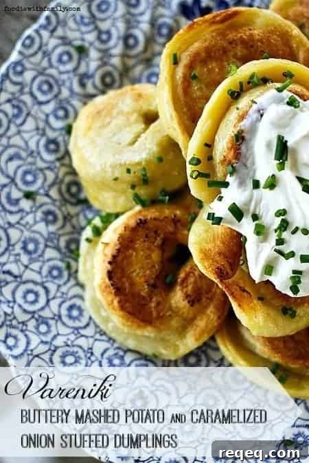 Potato and Caramelized Onion Vareniki (Stuffed Dumplings) 2 Vareniki {buttery mashed potato and caramelized onion stuffed pierogie style dumplings} with sour cream and chives. foodiewithfamily.com