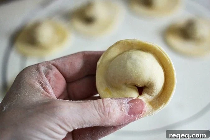 Potato and Caramelized Onion Vareniki (Stuffed Dumplings) 4 Shaping Vareniki {buttery mashed potato and caramelized onion stuffed dumplings} on foodiewithfamily.com