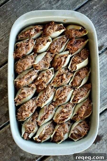 BBQ Pulled Pork Overstuffed Shells ready to bake foodiewithfamily.com #pasta #familyfriendly