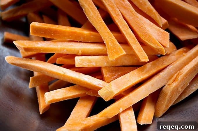 Crispy Oven-Baked Sweet Potato Fries That Always Turn Out Perfect 5 Guaranteed Crispy BAKED Sweet Potato Fries from foodiewithfamily.com
