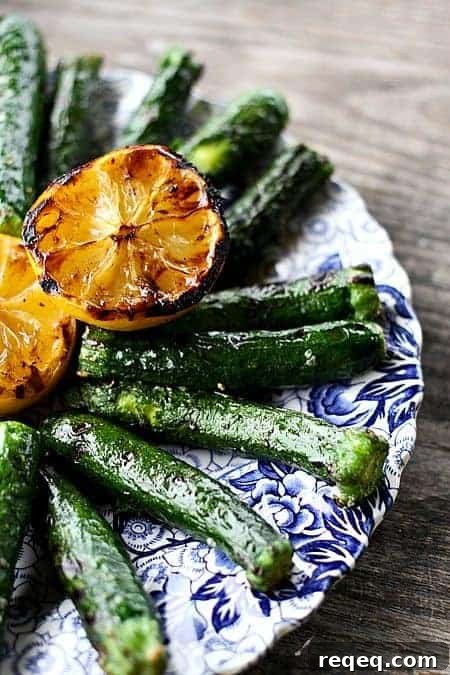 Lemon Pepper Grilled Zucchini Recipe for Perfect Summer Sides 3 Lemon Pepper Grilled Zucchini. Simple summer side dish that knocks your socks off. foodiewithfamily.com