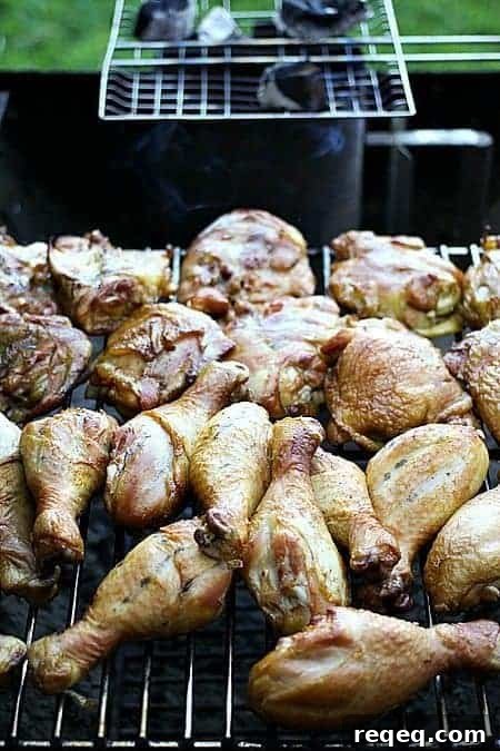 Stage 1 of a two-stage smoking and barbecuing process for chicken.