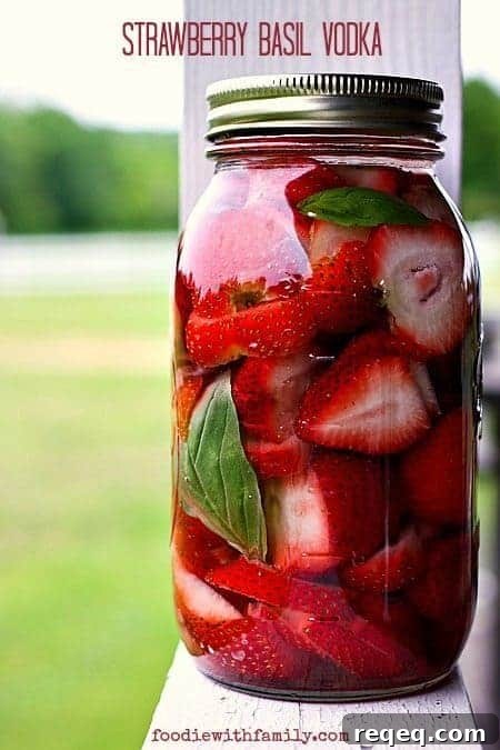 Strawberry Basil Lemonade Cocktail Recipe | Summer Boozy Drink 3 Strawberry Basil Infused Vodka for cocktails, baking, and cooking from foodiewithfamily.com