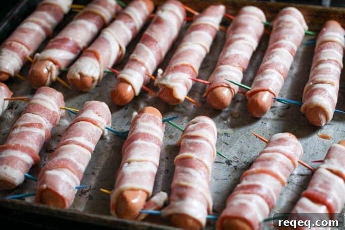 Smoky Bacon-Wrapped Hot Dogs with Crispy Grill Finish 4 Bacon wrapped hot dogs ready to grill, roast, or air-fry.