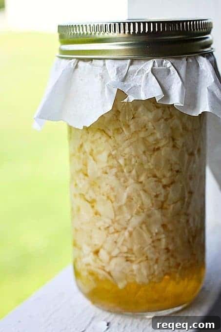 Coconut-Infused White Balsamic Vinegar: Flavorful Recipe Ideas 3 Coconut Infused White Balsamic Vinegar for fruit, fruit salad, and sipping in icy cold soda water!