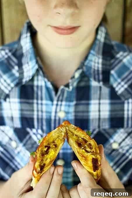 Ty's Best Breakfast Sandwich {scrambled eggs, crispy hashbrowns + bacon, and cheese in sourdough toast! foodiewithfamily.com