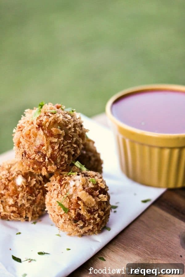 Prosciutto-Stuffed Arancini: Crispy Fried Risotto Balls with Cheese 2 Prosciutto Arancini {crispy cheese-stuffed, fried risotto balls} from foodiewithfamily.com
