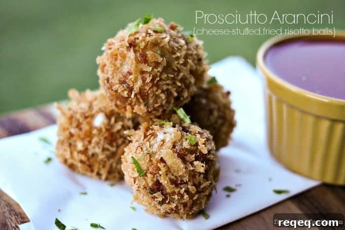 Prosciutto-Stuffed Arancini: Crispy Fried Risotto Balls with Cheese 3 Prosciutto Arancini {crispy cheese-stuffed, fried risotto balls} from foodiewithfamily.com