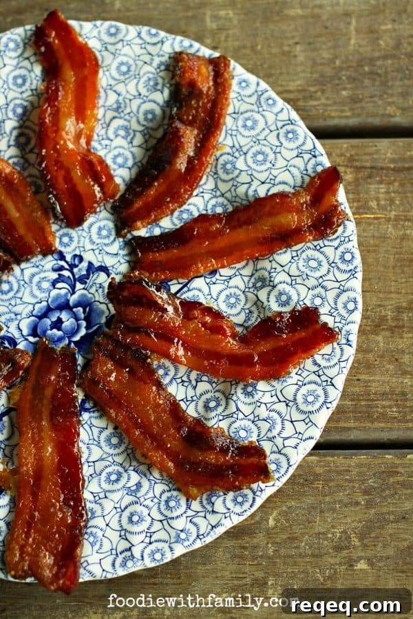 Maple-Glazed Candied Bacon: Sweet & Crispy Bacon Recipe 5 Easy, homemade Maple Candied Bacon from foodiewithfamily.com