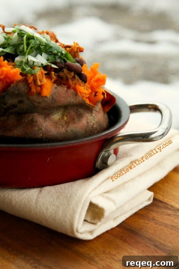 Loaded Baked Sweet Potatoes with pulled chicken, black beans, and cilantro, onion, and lime relish