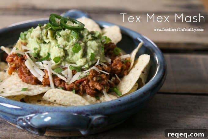 Tex-Mex Mashup: Flavor-Packed Recipes for Party Nights 3 Tex Mex Mash: smashed pinto beans, seasoned browned ground beef, and crispy bacon simmered in a garlicky, chipotle tomato sauce from foodiewithfamily.com