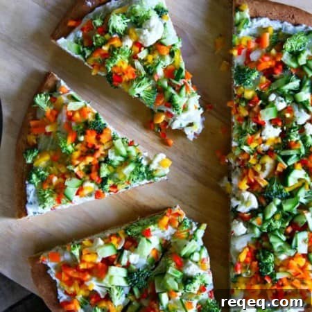 Get your snack on with Snacky Ranch Cream Cheese Vegetable Pizza from foodiewithfamily.com