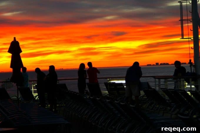 Carnival Breeze Sailing: Itineraries, Tips & What to Expect 4 Sunset outside of the Port of Miami sailing on the #CarnivalBreeze #Client