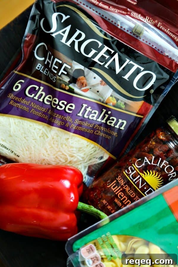 sundried tomatoes cheese tortellini roasted red pepper italian cheese blend chicken