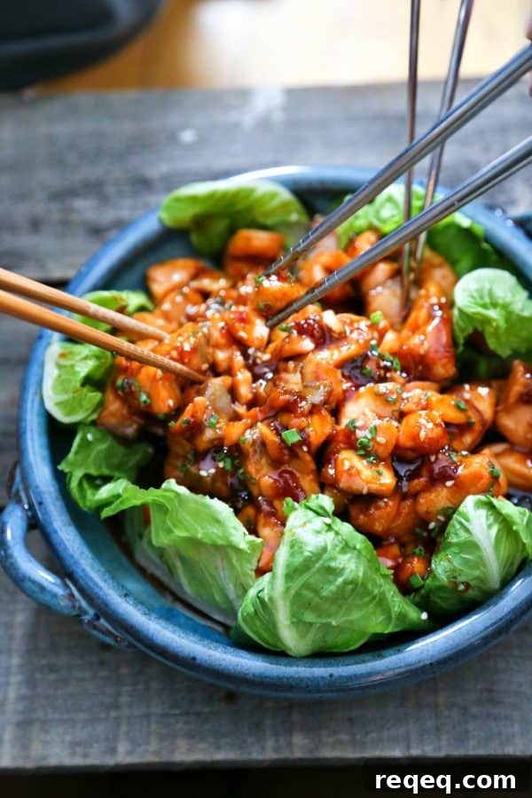 Honey Sriracha Glazed Salmon Bites – Sweet Spicy Salmon Skewers 4 Honey Sriracha Glazed Salmon Bites: Tender salmon tossed in a sticky, sweet, spicy mahogany sauce. Serve in lettuce wraps, or on hot rice.
