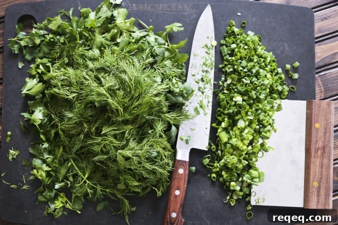 All the herbs for Persian Herb Frittata a.k.a. Kookoo Sabzi from foodiewithfamily.com