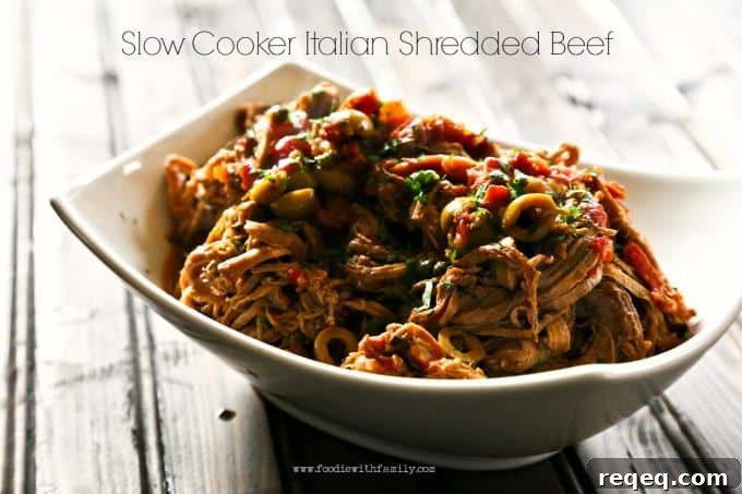 Tender Slow Cooker Shredded Beef Recipe for Sandwiches & Tacos 4 Slow-Cooker Italian Shredded Beef from foodiewithfamily.com