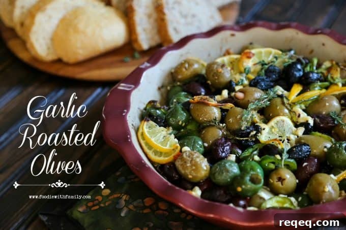 Roasted Garlic Olives Recipe: Savory Marinated Snack or Appetizer 3 Garlic Roasted Olives with lemon, thyme, feta, and peppers