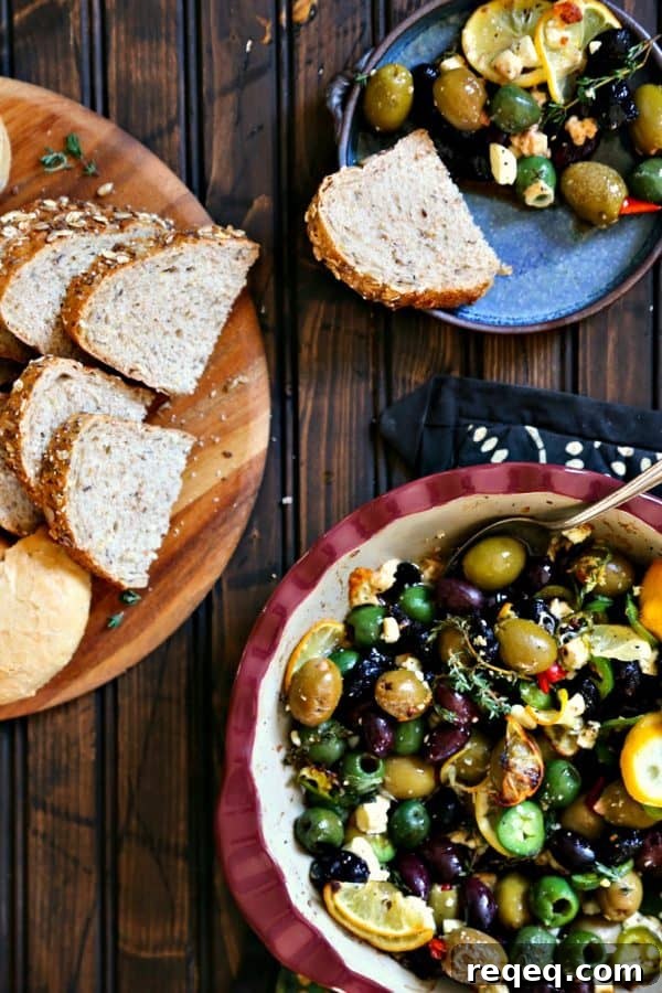 Roasted Garlic Olives Recipe: Savory Marinated Snack or Appetizer 4 Garlic Roasted Olives with lemon, thyme, feta, and peppers