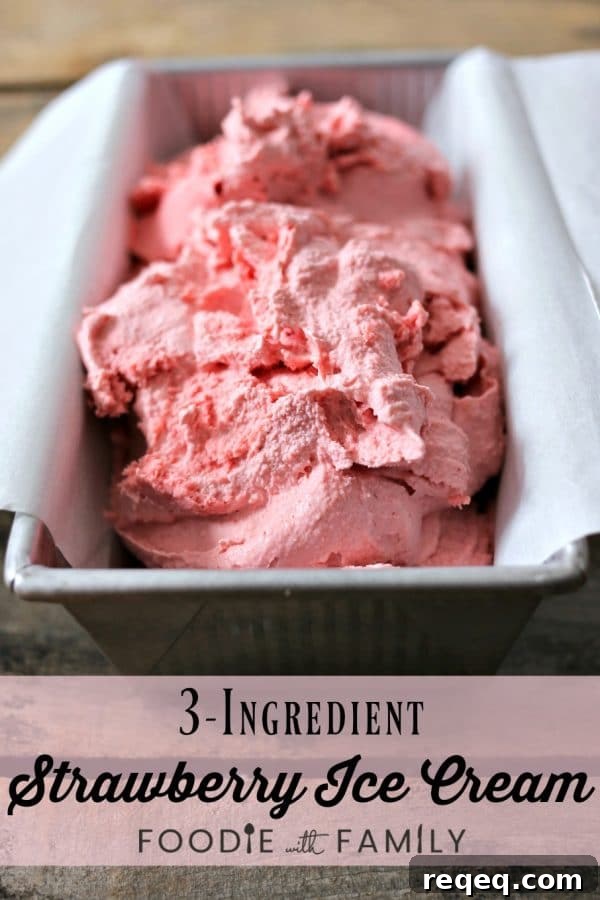 Creamy 3-Ingredient Strawberry Ice Cream Recipe 6 3-ingredient strawberry ice cream, parchment paper lined aluminum bread pan, rustic wooden table