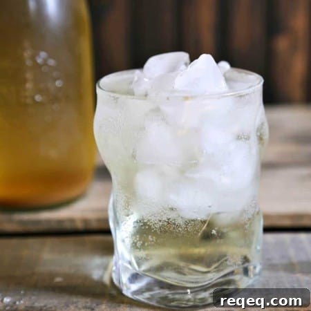 Ginger Switchel Drink made with water, honey, raw apple cider vinegar, and lots of ginger.