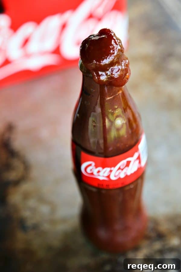 Smoky, tangy, spicy, thick, and sweet, this Bold Coca-Cola Barbecue Sauce is everything you want in a barbecue sauce and is as easy as can be to boot!