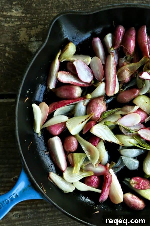 Crispy Roasted Radishes and Caramelized Onions Recipe 5 Halfway through the roasting for Crispy Roasted Radishes with Onions