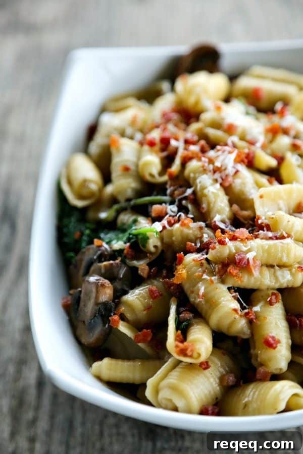 Mushroom, Kale & Pancetta Pasta Recipe for Weeknight Dinners 2 Simple Mushroom Kale Pasta with Pancetta from foodiewithfamily.com