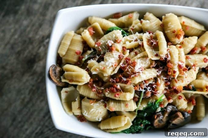 Mushroom, Kale & Pancetta Pasta Recipe for Weeknight Dinners 4 Simple Mushroom Kale Pasta with Pancetta from foodiewithfamily.com