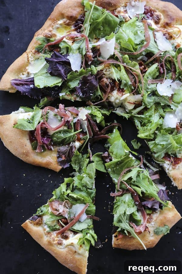 Tuscan Fig & Prosciutto Pizza with Arugula and Balsamic 3 Figgy Pig Pizza - Tuscan Style Prosciutto, fig jam, and greens pizza from foodiewithfamily.com #client #DaVinciStoryteller