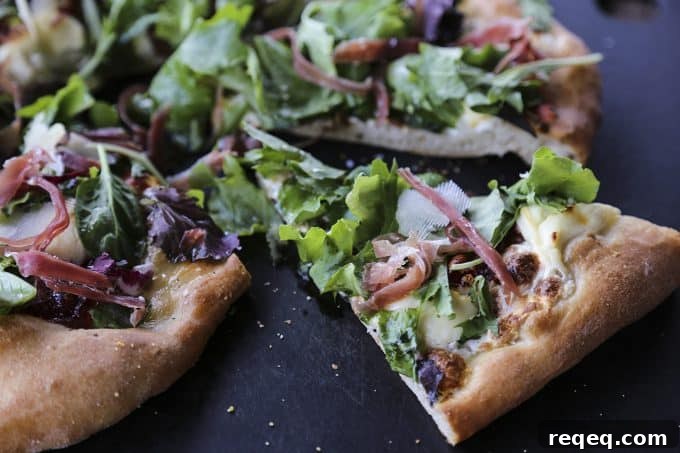 Tuscan Fig & Prosciutto Pizza with Arugula and Balsamic 6 Figgy Pig Pizza - Tuscan Style Prosciutto, fig jam, and greens pizza from foodiewithfamily.com