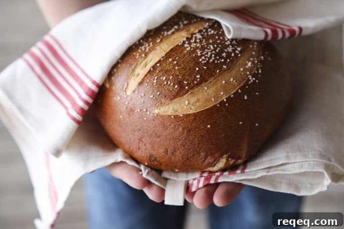 Soft Pretzel Bread Recipe: Chewy, Golden Loaf You Can Make at Home 2 Soft Pretzel Bread and a video tutorial for shaping the round from foodiewithfamily.com