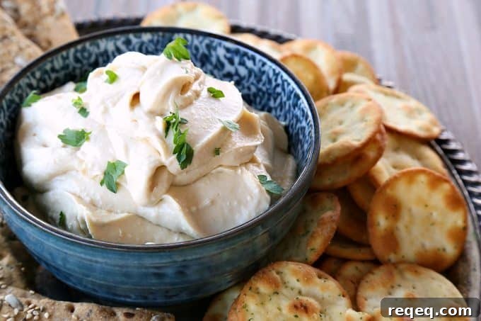 Whipped Roasted Garlic Feta Hummus Recipe for Creamy Dip 3 Whipped Roasted Garlic Feta Hummus in partnership with @Sabradippingco #Gameday #Superbowl