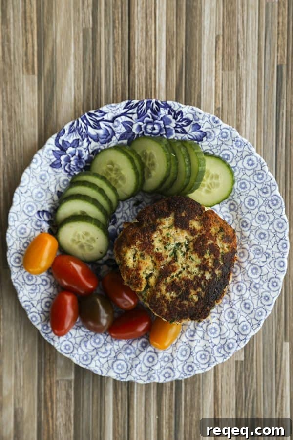 Crispy Cod Burger Recipe with Tangy Tartar Sauce 3 Crispy Cod Burgers with chives and Old Bay