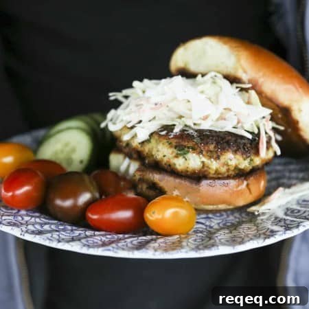Healthy, simple Crispy Cod Burgers with chives and Old Bay