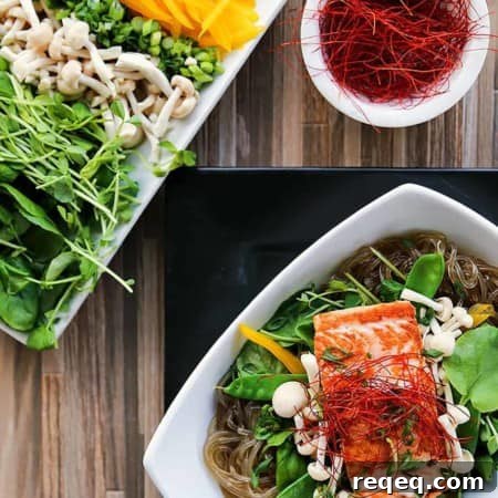 Asian Salmon Noodle Bowls with Greens and Sesame Ginger Dressing 4 Salmon + Greens Asian Noodle Bowls from foodiewithfamily.com with glass noodles